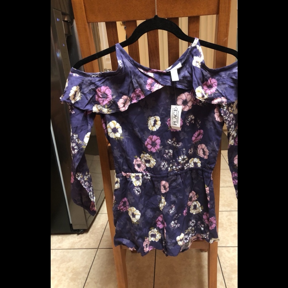 Purple romper with flowers